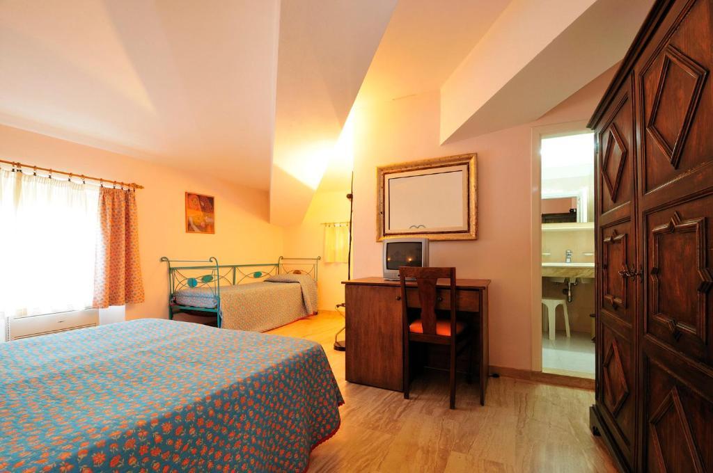 Hotel Villa Campana Cala Liberotto Chambre photo